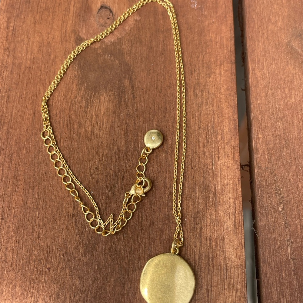 Elegant Gold Pendant “U” Necklace with diamond accent on clasp